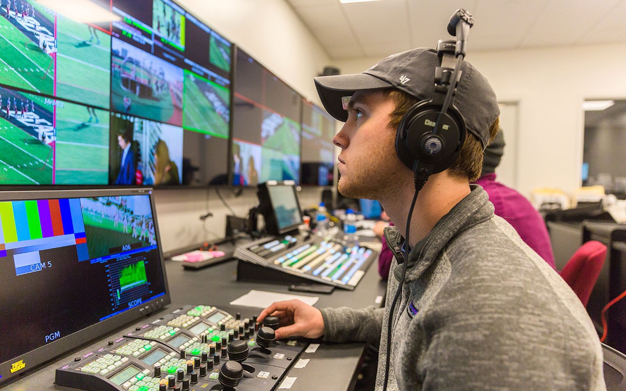Sports Media Production students work in the Nippert Stadium ESPN+ Control Room