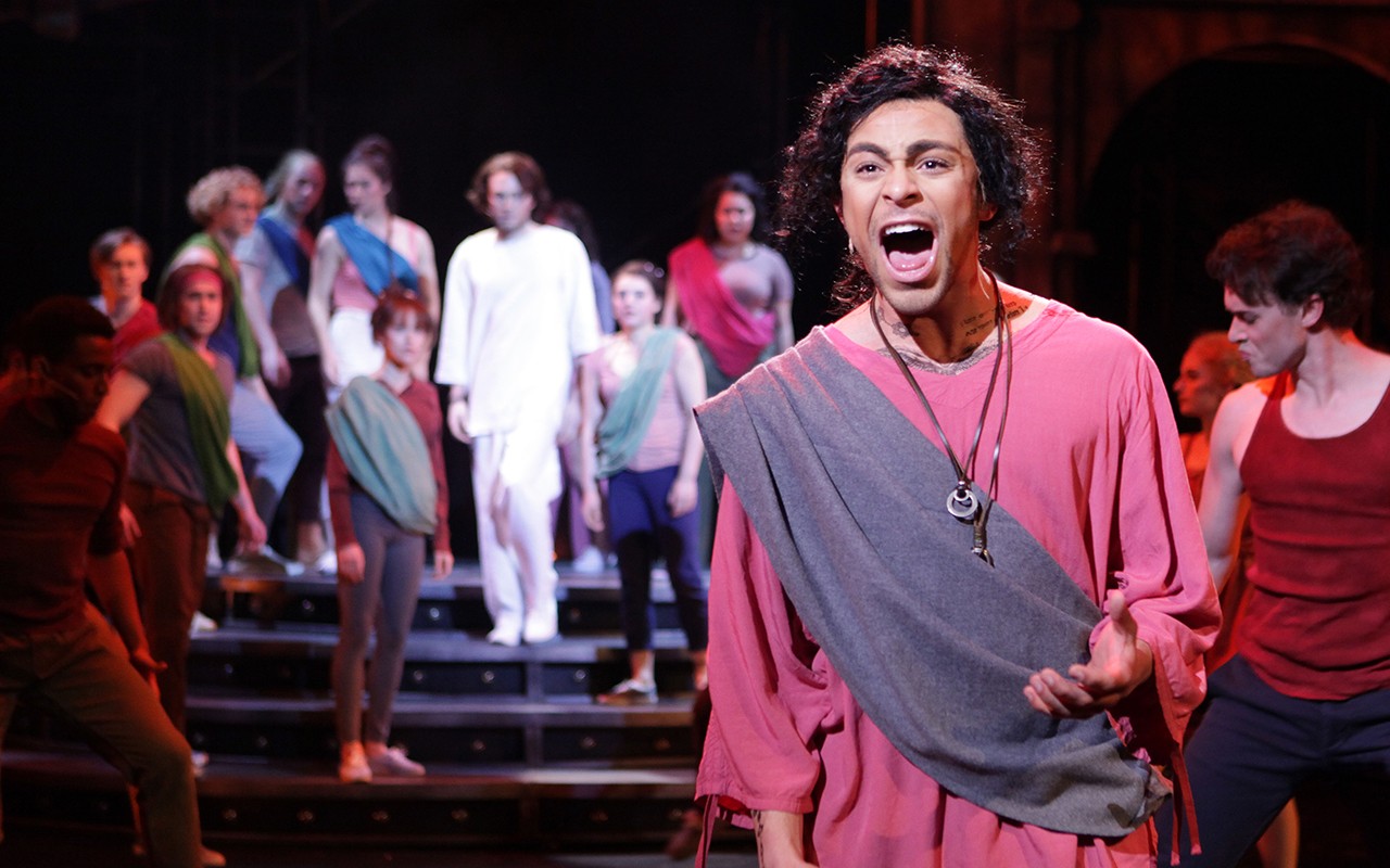 A male musical theatre student sings on stage during a performance of Jesus Christ Superstar