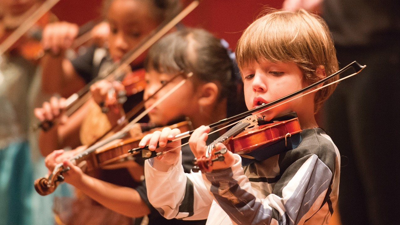 Prep children performing on violin
