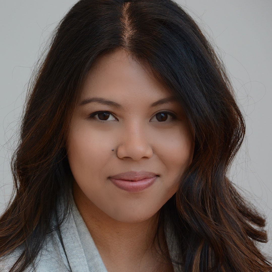 A headshot of Joy Lanceta Coronel