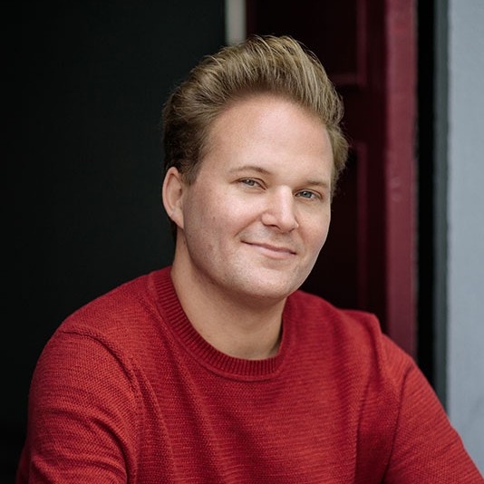 A Headshot of William Langley